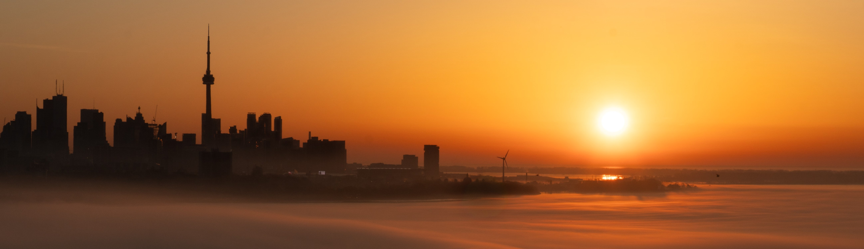 
        <div class='title'>
          Toronto Foggy Sunrise
        </div>
       