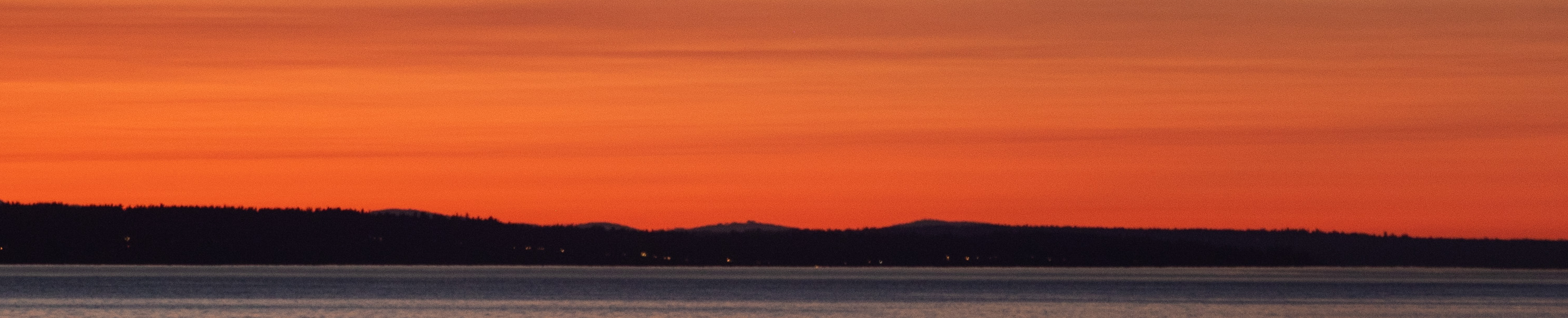 
        <div class='title'>
          Red Sky Over the Ocean Banner
        </div>
       