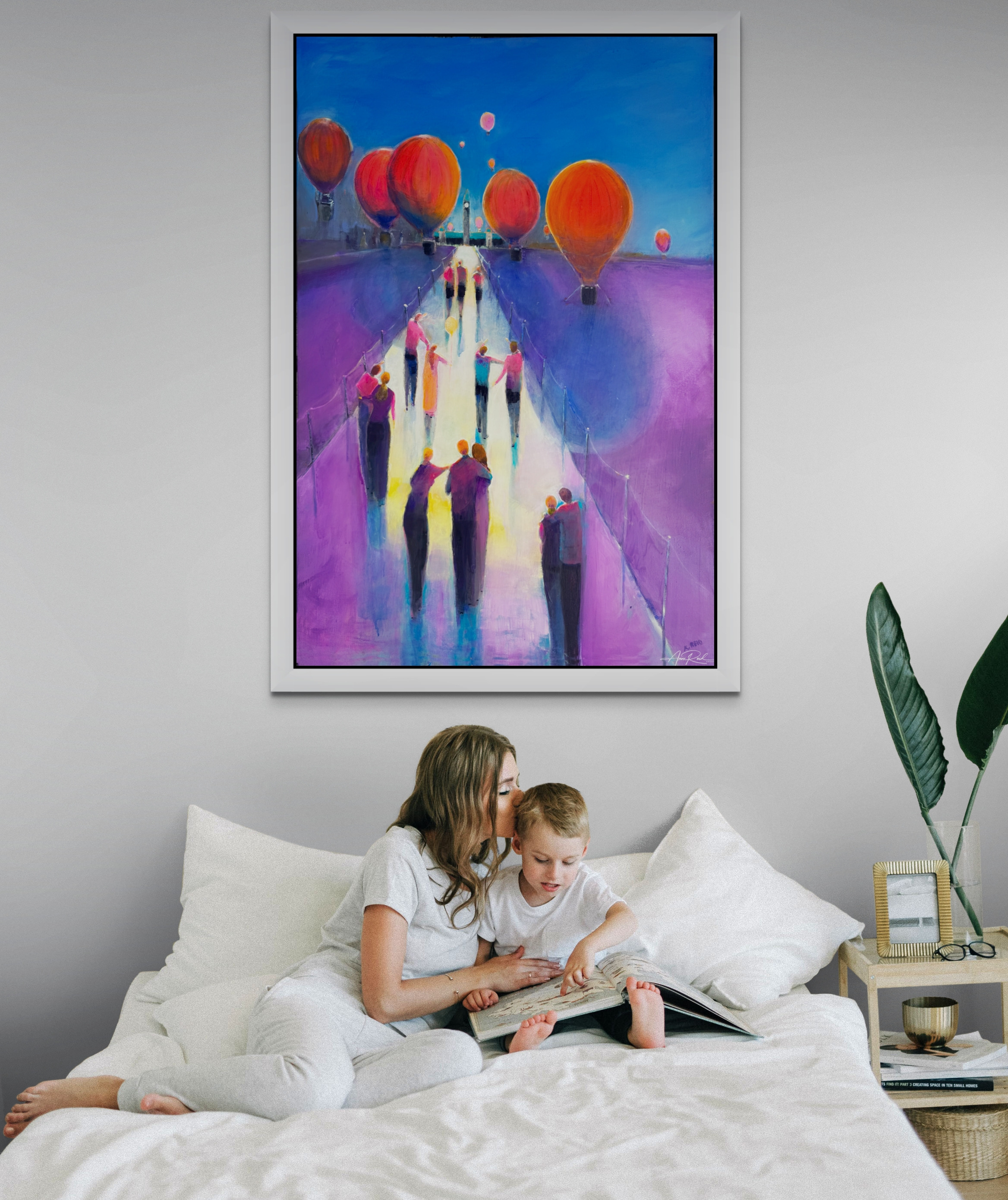 Canada Arise fine art print by Anne Reid Artist styled in a bedroom with mother and son—soft dawn light and family-forward warmth.
