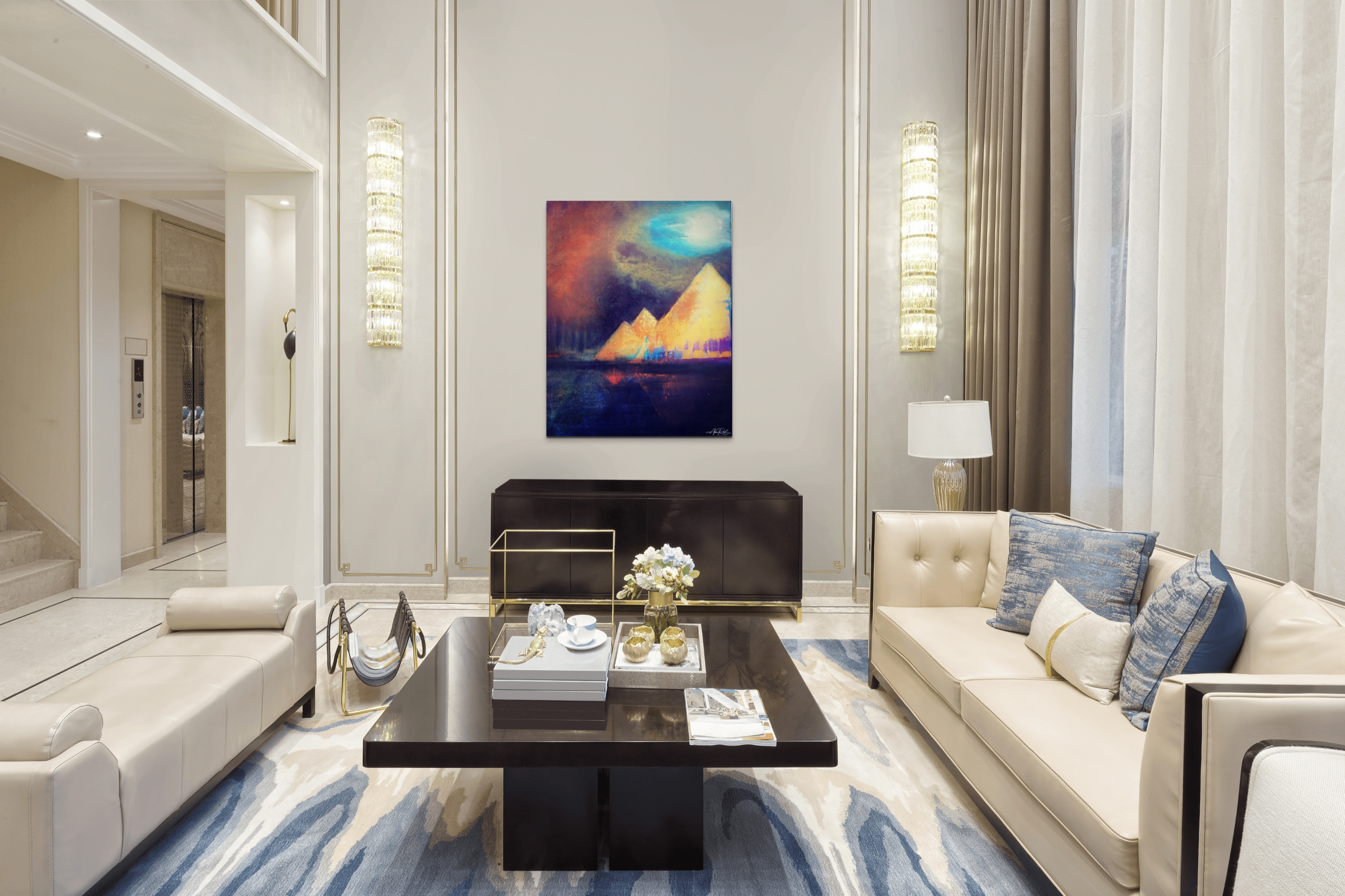 Egypt 2 open edition fine art print in a luxury living room with cream seating, blue accents, and chandelier sconces