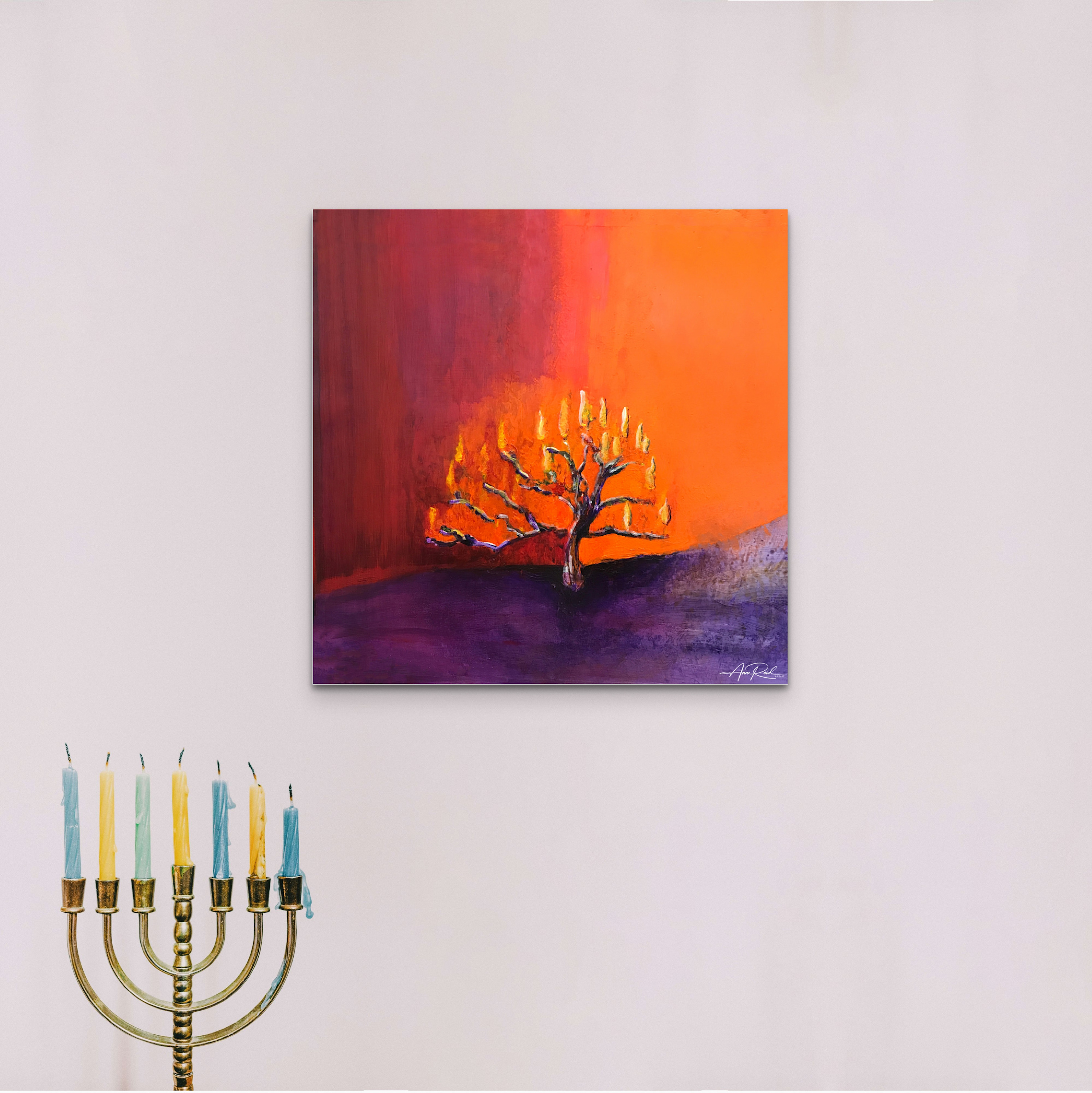 Burning Bush fine art print by Anne Reid Artist shown above a bed in a warm bedroom setting.
