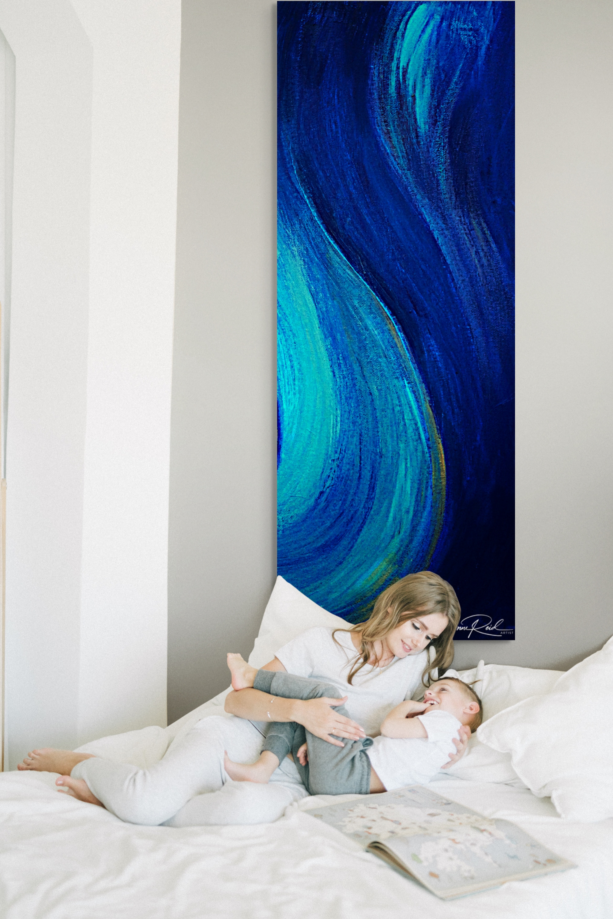 Mercy 2, fine art print by Anne Reid Artist shown above a bed in a bedroom setting.